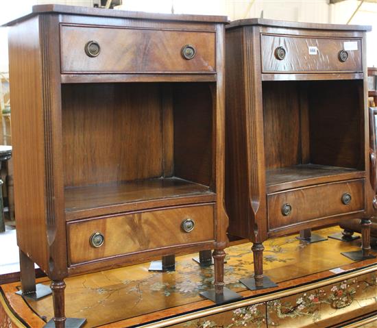 Pair of concave bedside cabinets